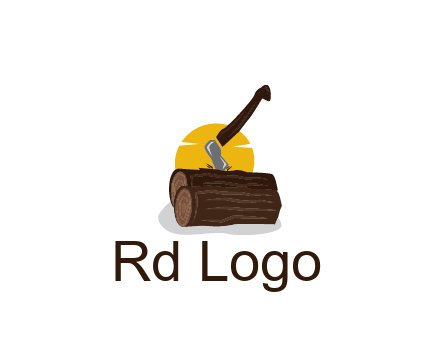 sun behind axe in logs