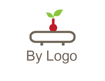 vase on table with plant logo
