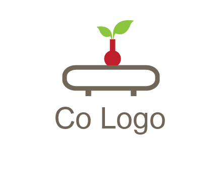 vase on table with plant logo