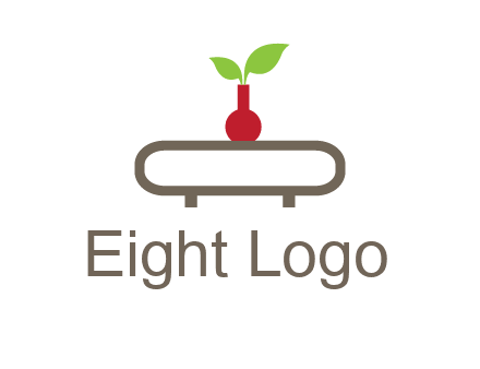 vase on table with plant logo