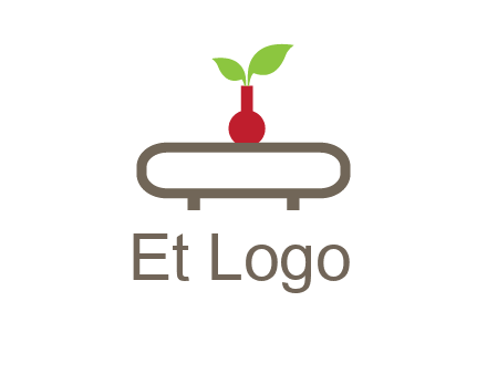 vase on table with plant logo