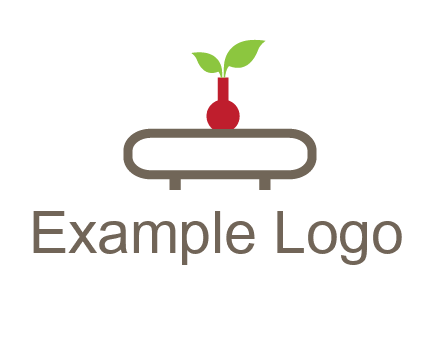 vase on table with plant logo