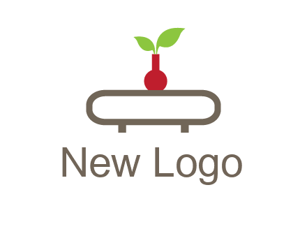 vase on table with plant logo