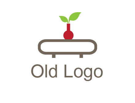 vase on table with plant logo