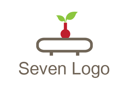 vase on table with plant logo