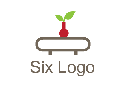 vase on table with plant logo