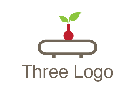 vase on table with plant logo