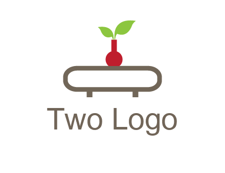 vase on table with plant logo