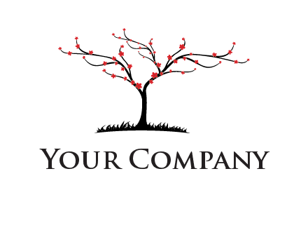 tree with flowers on grass logo